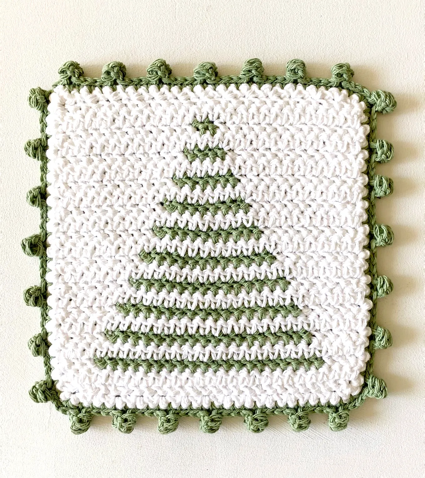 Colorful Crocheted Face Scrubber with Festive Tree Design