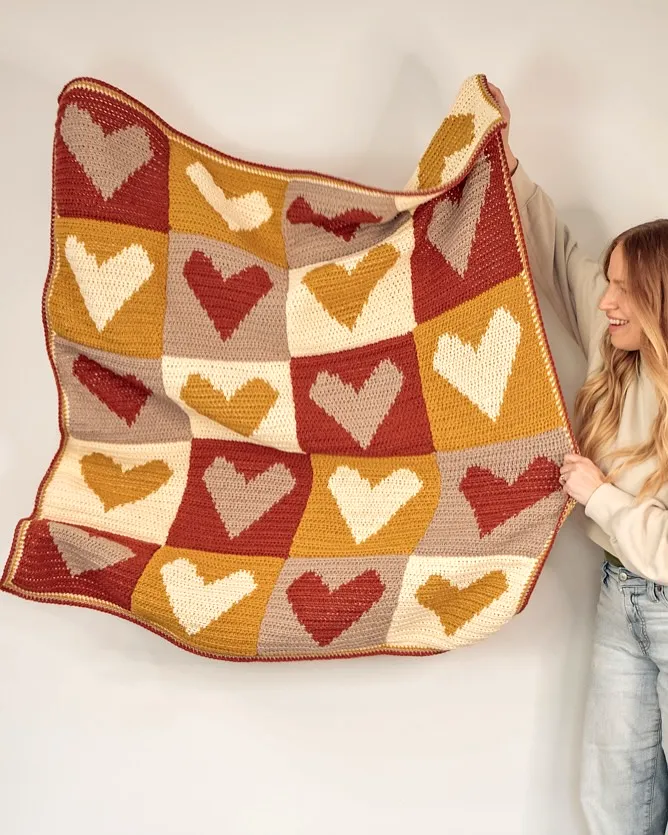Cozy Crochet Pet Blanket with Heart Motif in Warm Colors