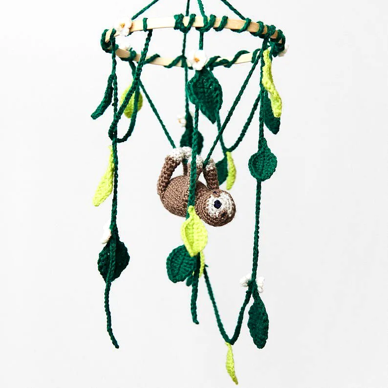 Crochet Crib Mobile featuring Colorful Sloth and Vibrant Leaves