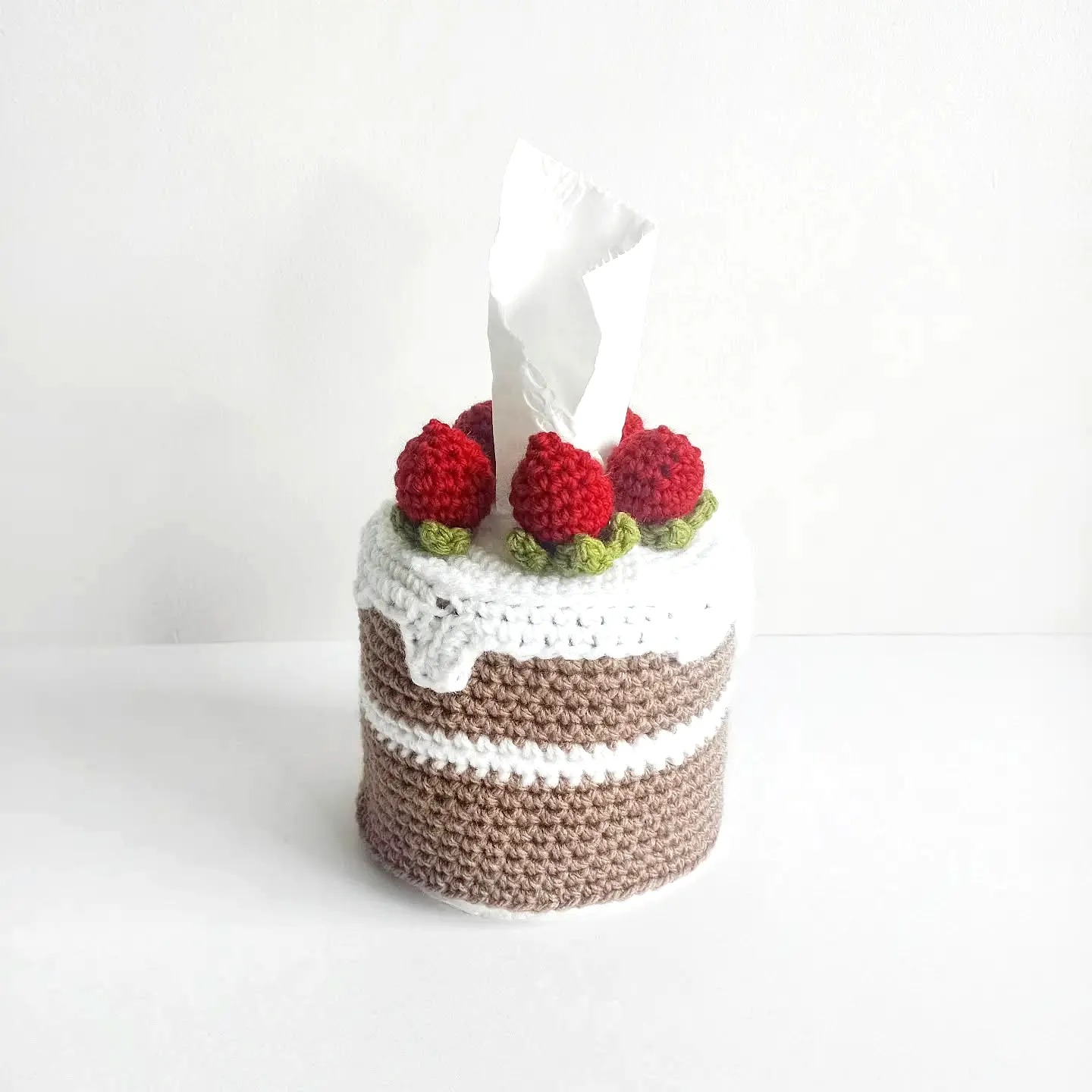 Cute cake style crochet tissue box cover in vibrant colors