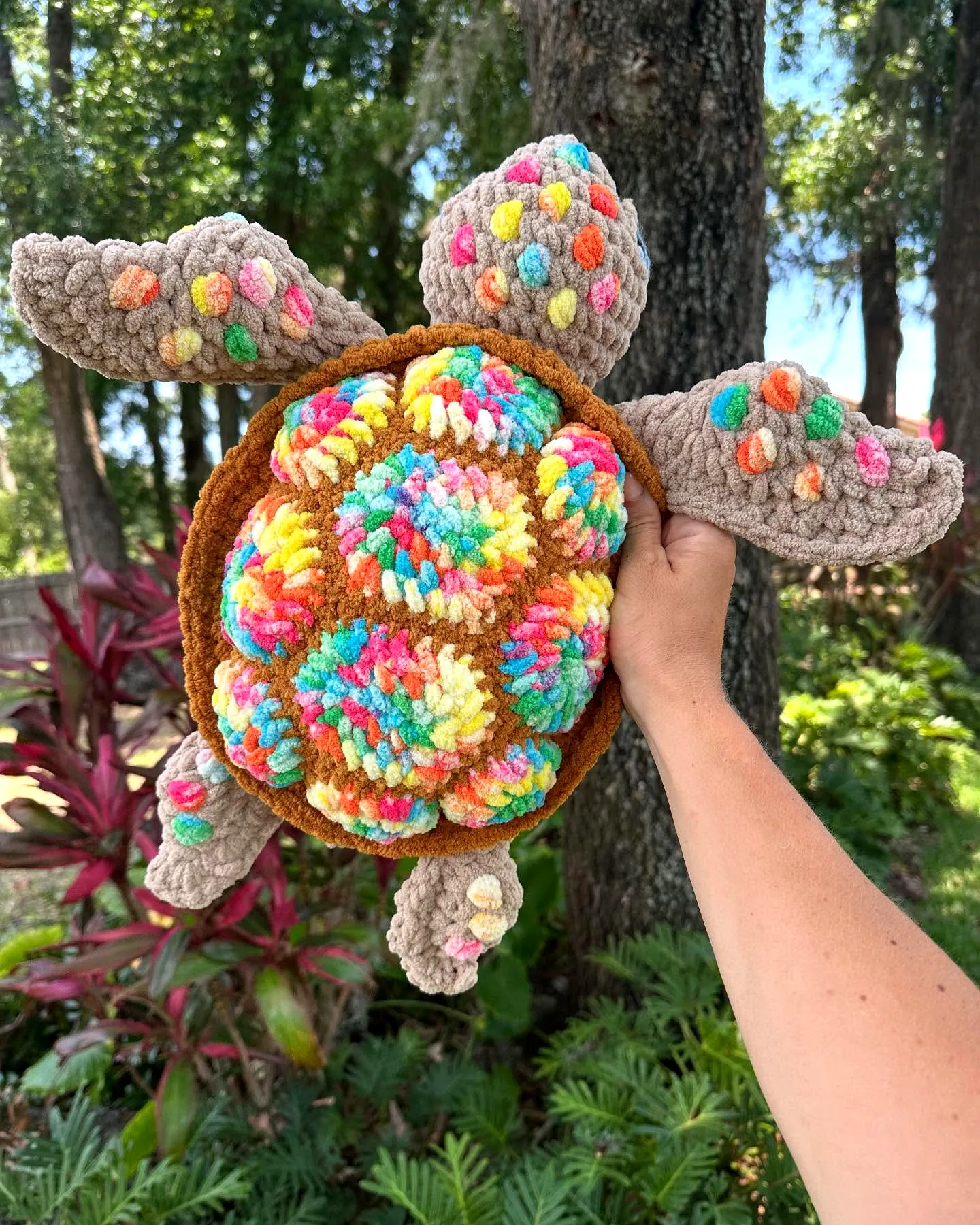 Cute colorful crochet turtle plush toy with textured shell