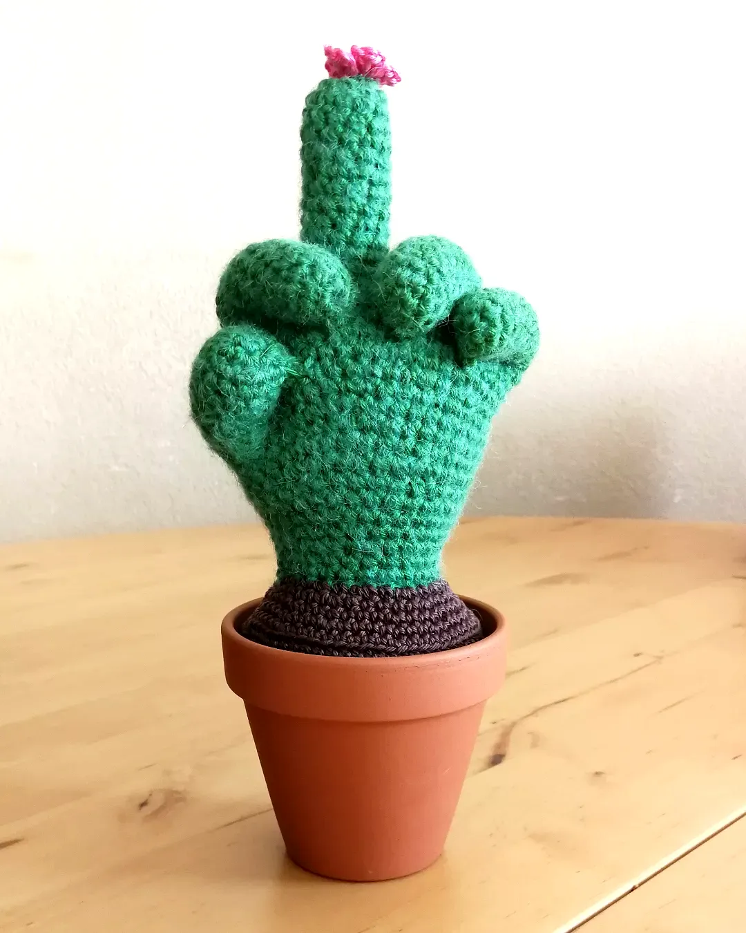 Cute Crochet Cactus in Vibrant Green with a Pink Flower