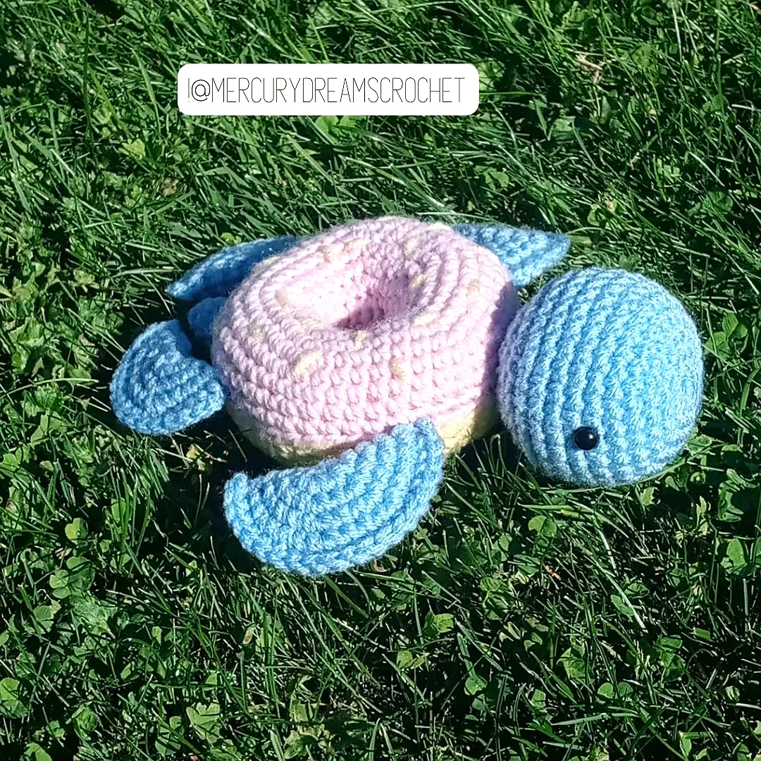 Cute crochet donut turtle in pastel pink and blue for intermediates