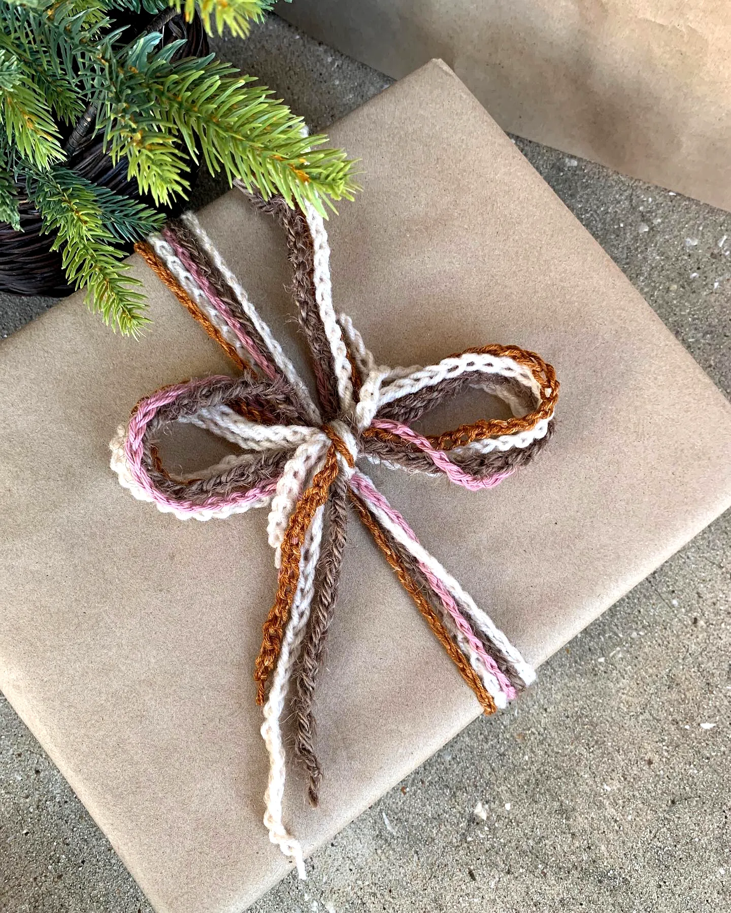 Cute crochet gift wrap with colorful bow for easy gifting