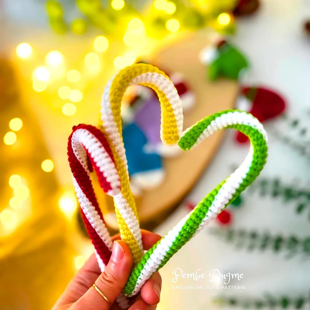 Cute crochet ornament candy cane in vibrant holiday colors