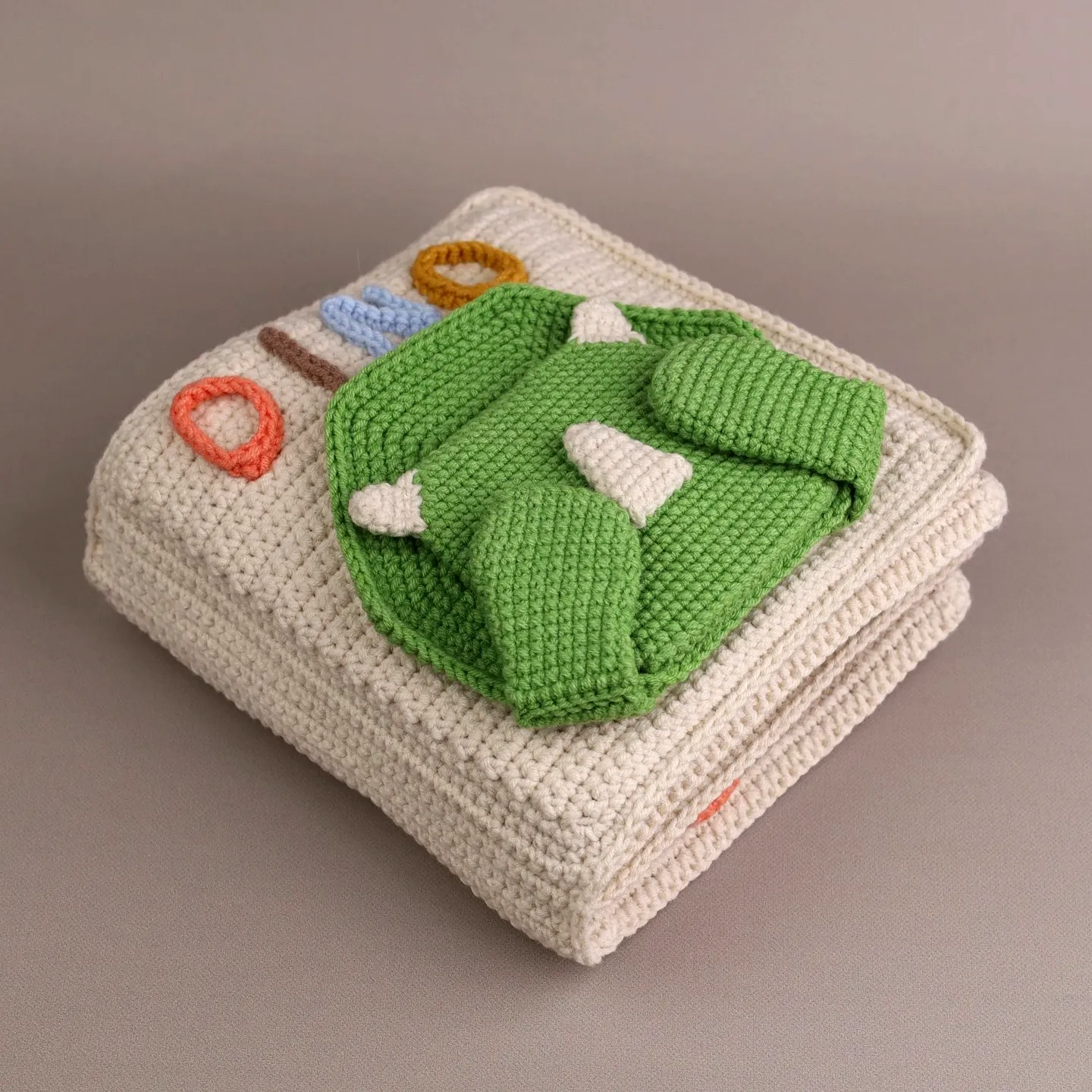 Cute Crochet Toy in Cream with 3D Green and Colorful Details