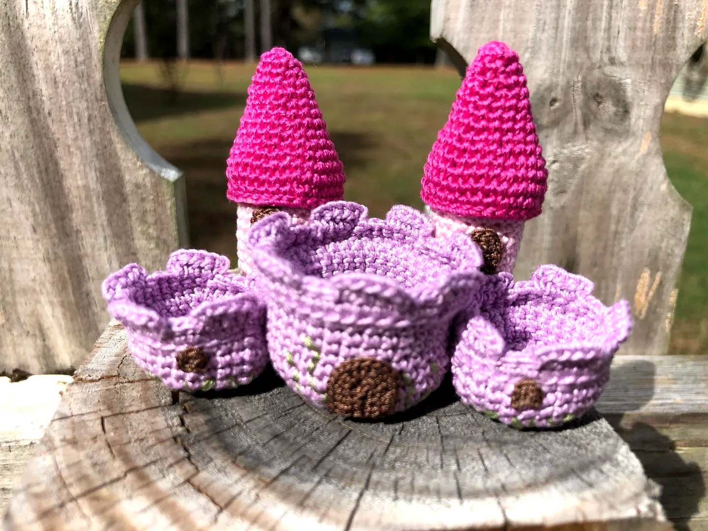 Delightful crochet castle with pink towers and purple cups