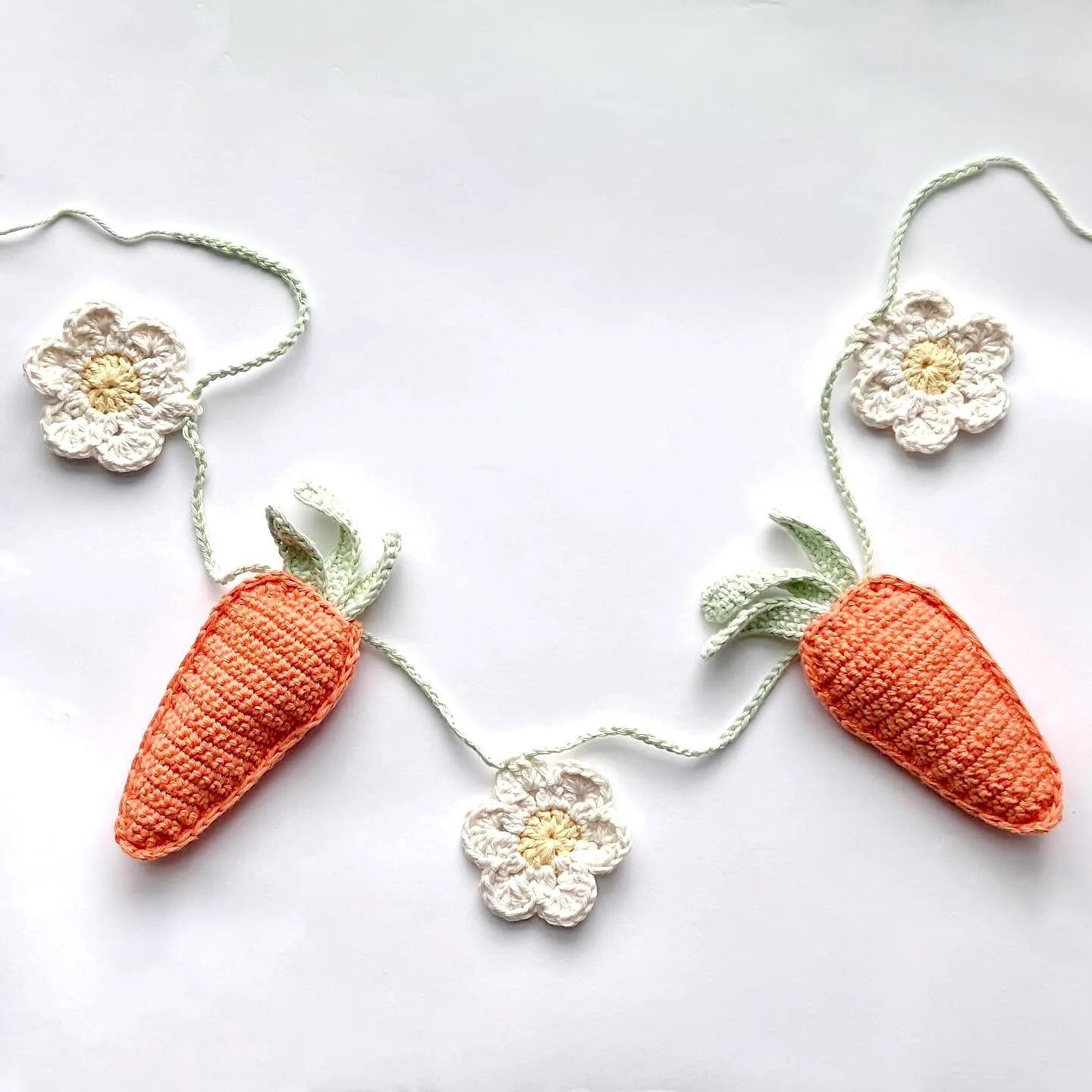Delightful Crochet Garland with Colorful Carrots and Flowers