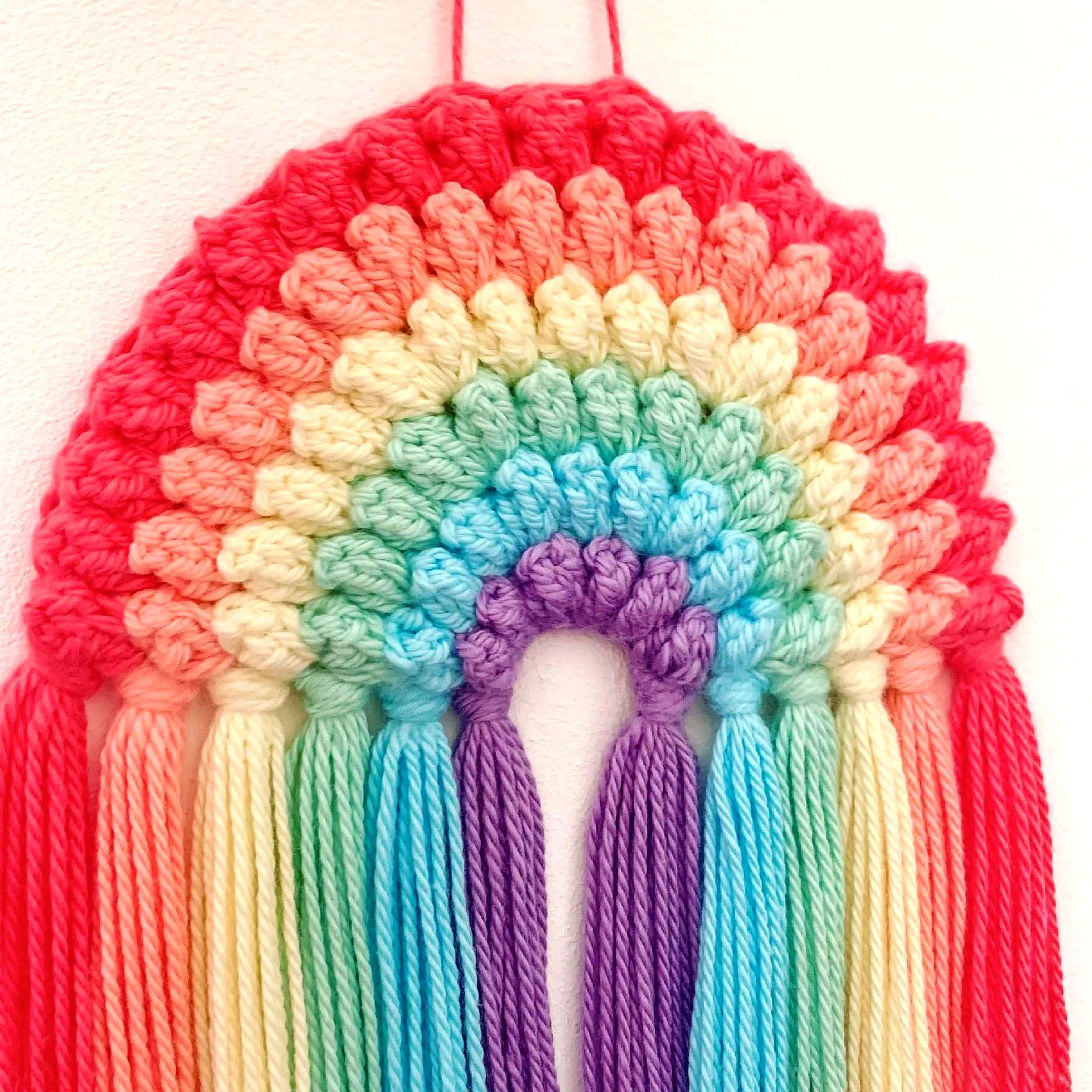 Easy Vibrant Rainbow Crochet Wall Decor in Pastel Colors