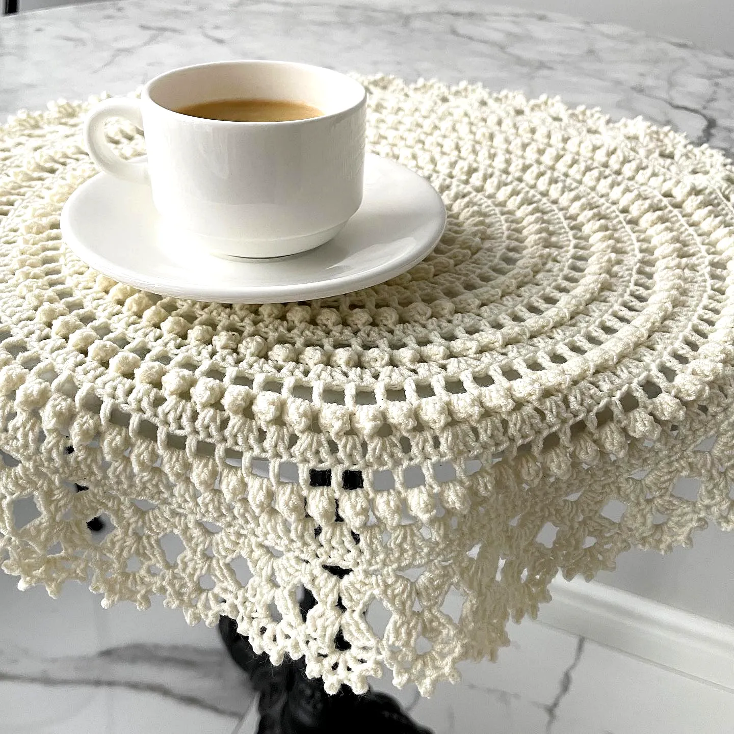 Elegant cream crochet placemat with intricate lace design