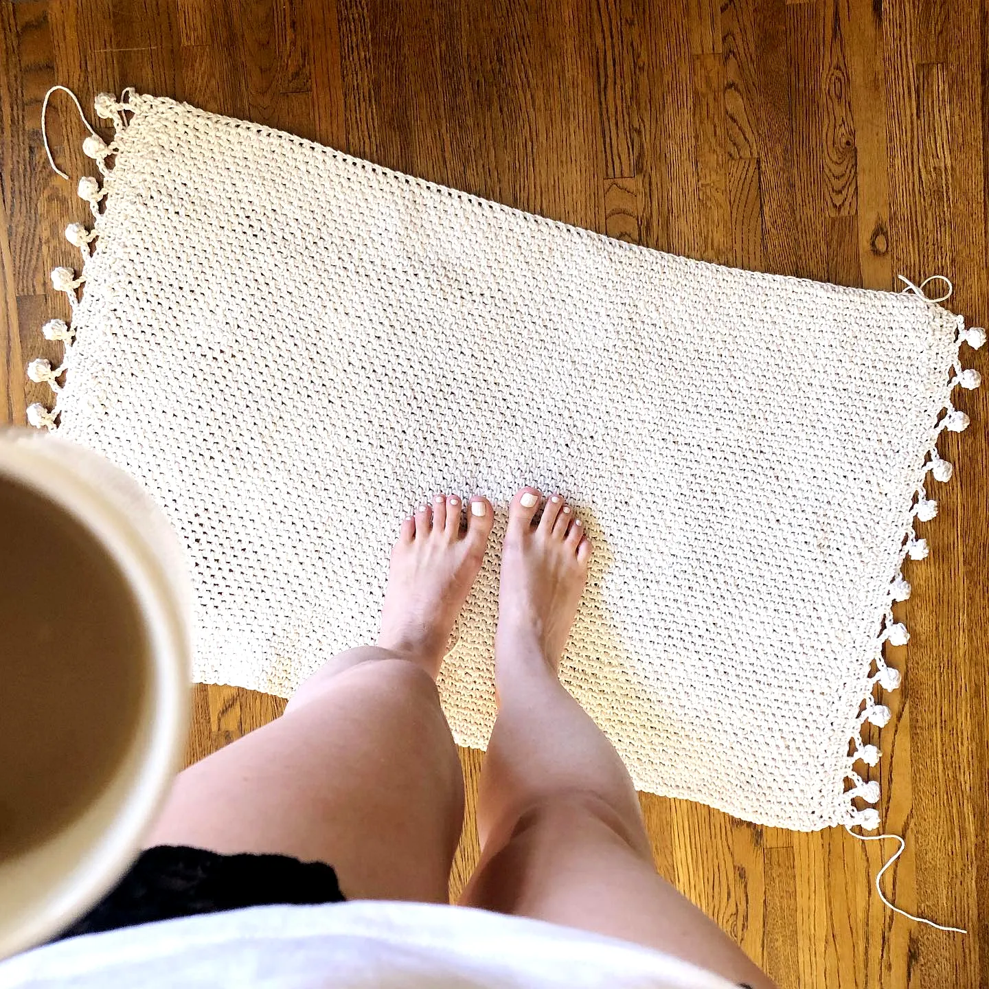 Stylish Crochet Bath Mat in Cream with Playful Pom-Pom Edges
