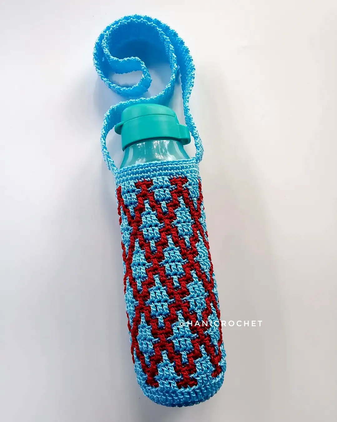 Stylish Crochet Bottle Cozy in Vibrant Blue and Red Geometric