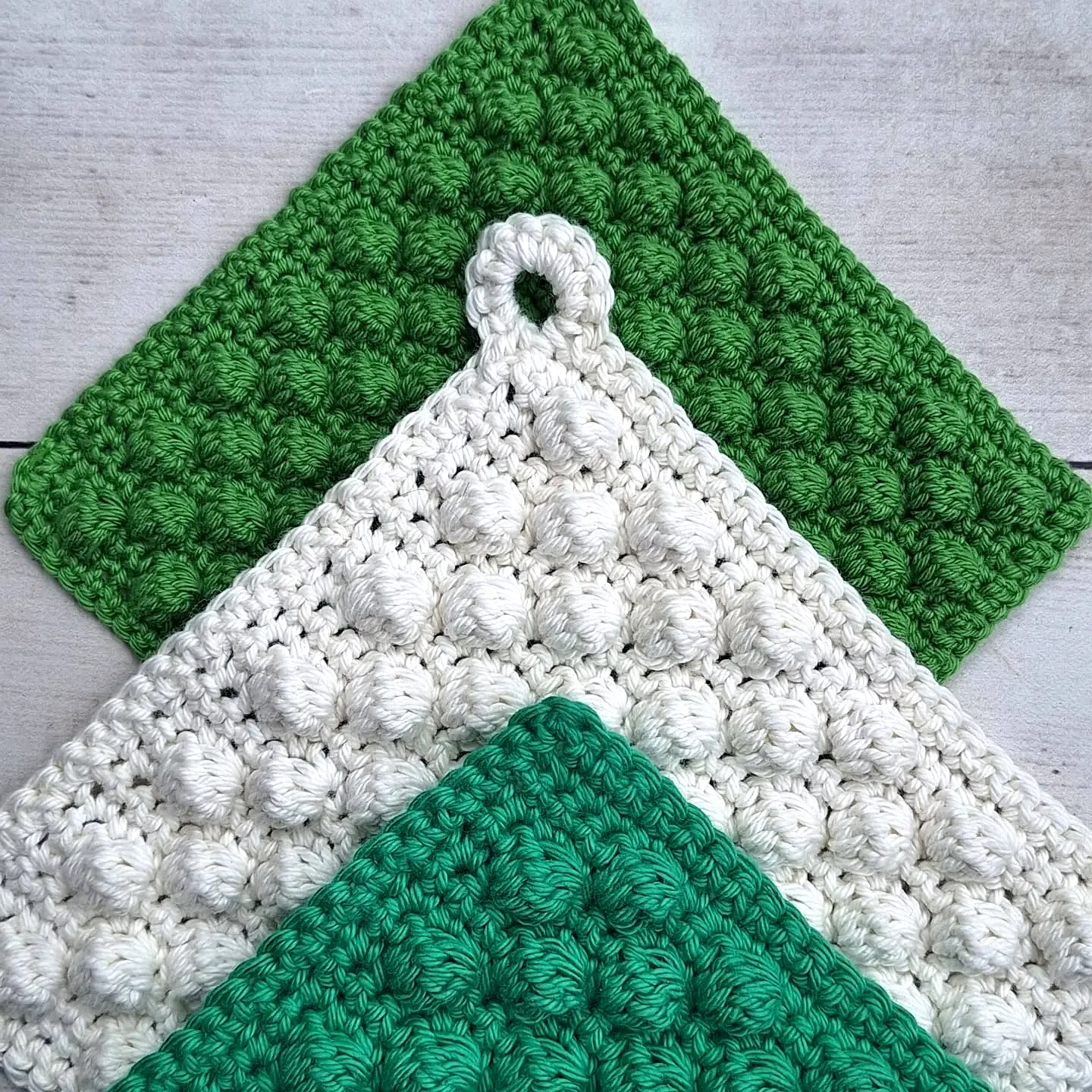 Stylish Crochet Washcloth in Green and White Bobble Stitch Design