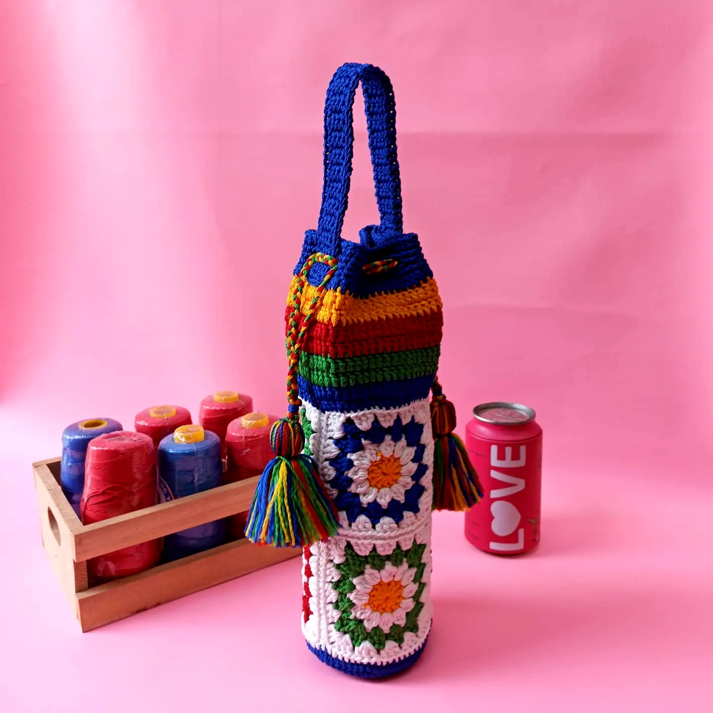 Vibrant Crochet Bottle Cozy with Colorful Geometric Design