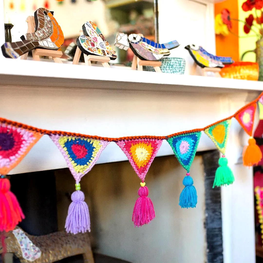 Vibrant Crochet Bunting with Colorful Flags and Tassels for Fun Decor