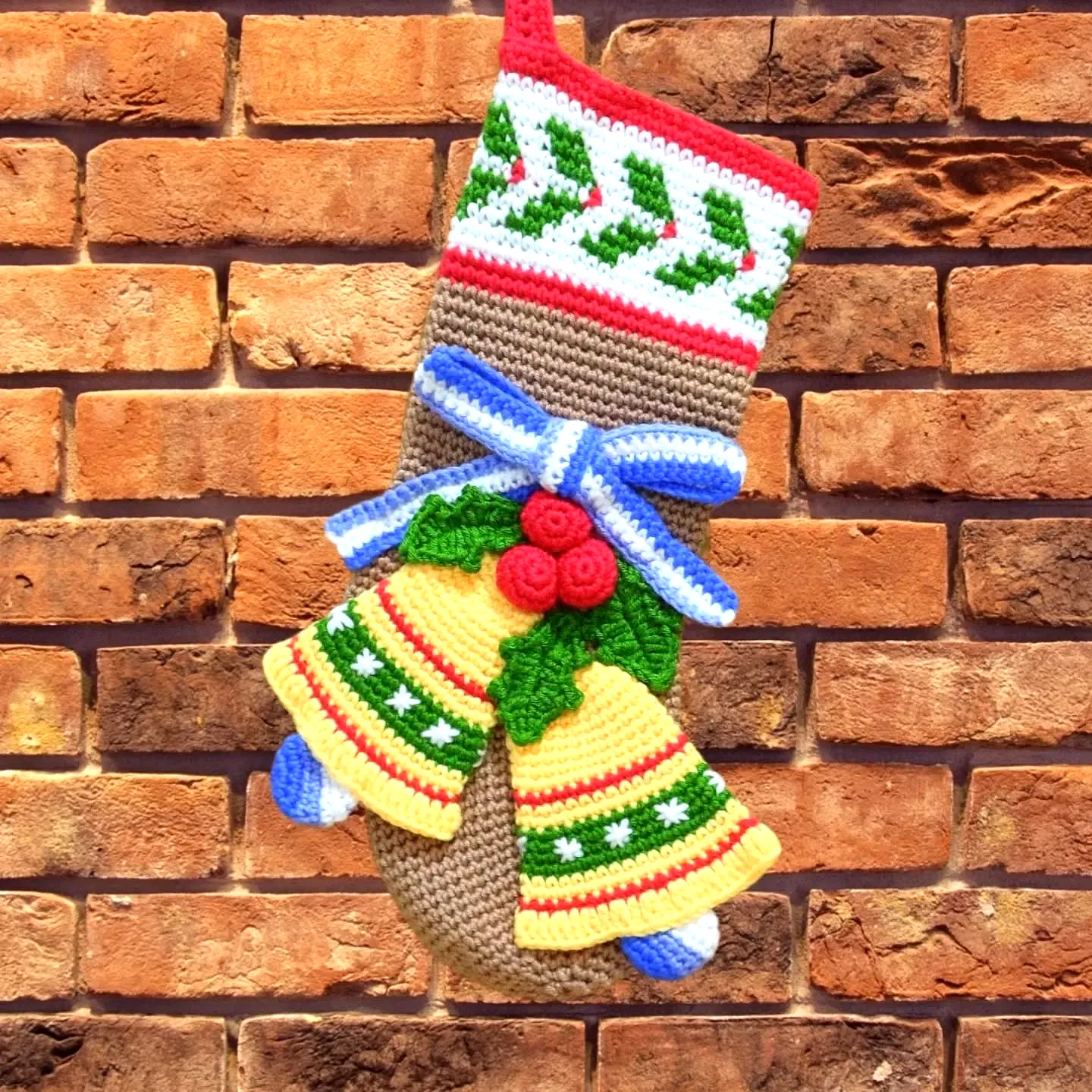 Vibrant Crochet Christmas Stocking with Bells and Holly Design