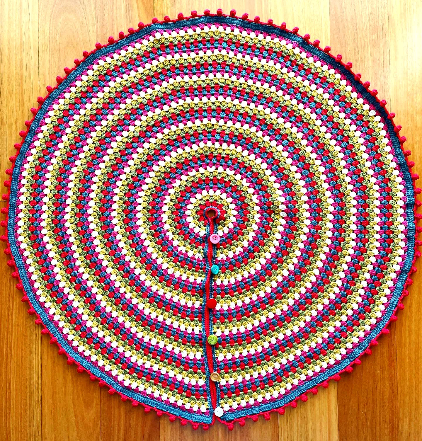 Vibrant Crochet Christmas Tree Skirt with Playful Buttons