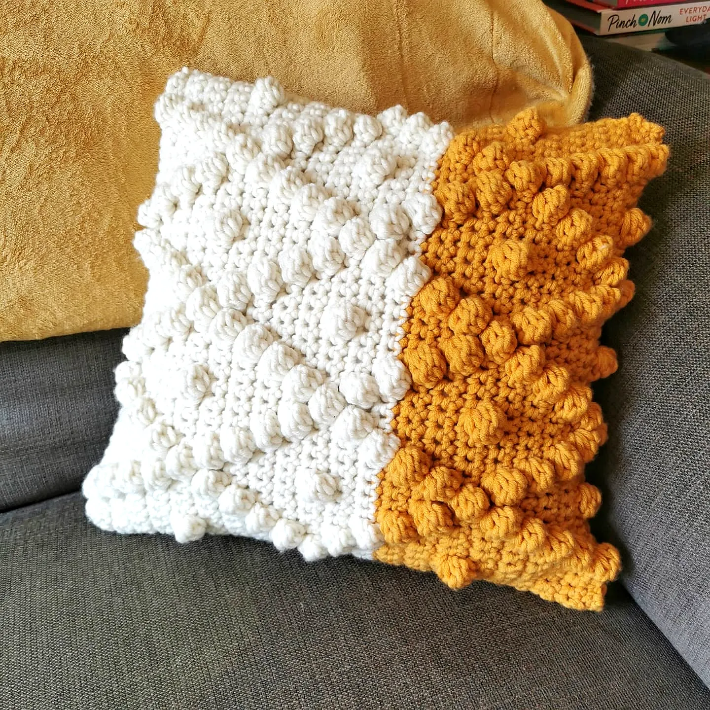 Vibrant Crochet Cushion Cover with Bobble Stitch Design