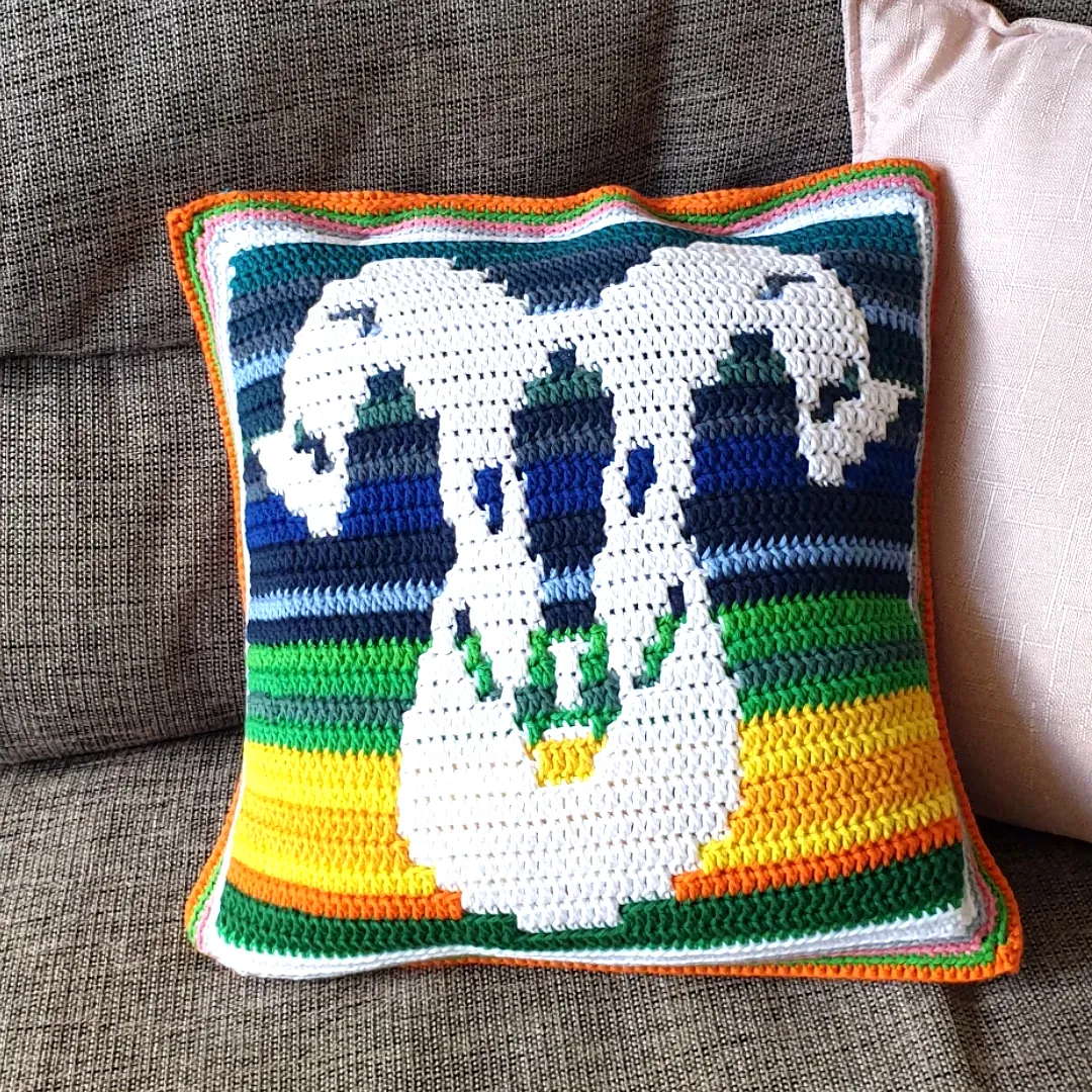 Vibrant Crochet Cushion Cover with Colorful Stripes and Motif