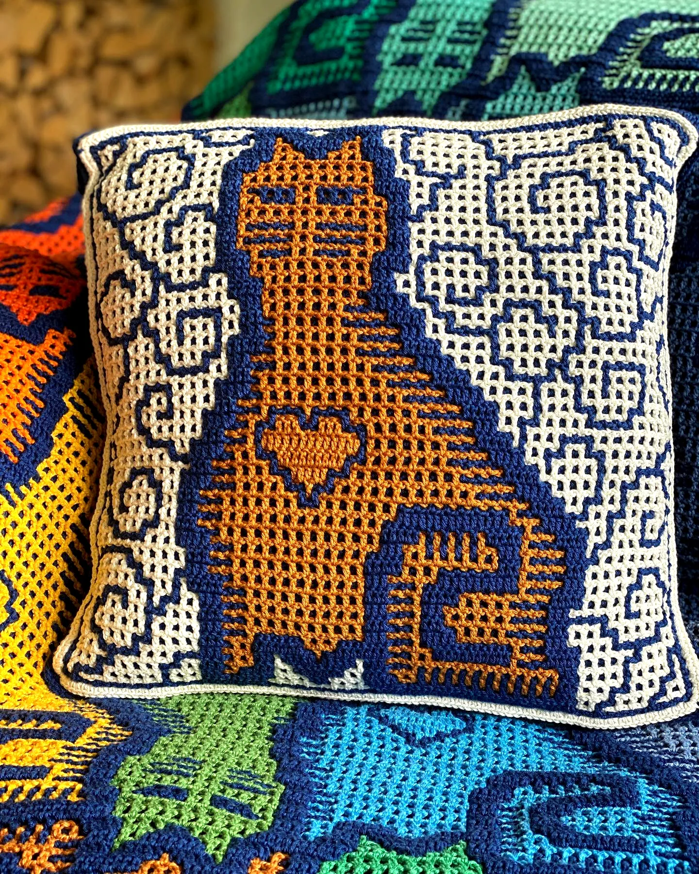 Vibrant Crochet Cushion Cover with Playful Cat Design
