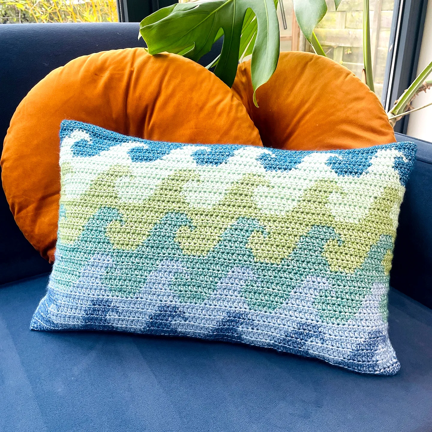 Vibrant Crochet Cushion with Wave Pattern