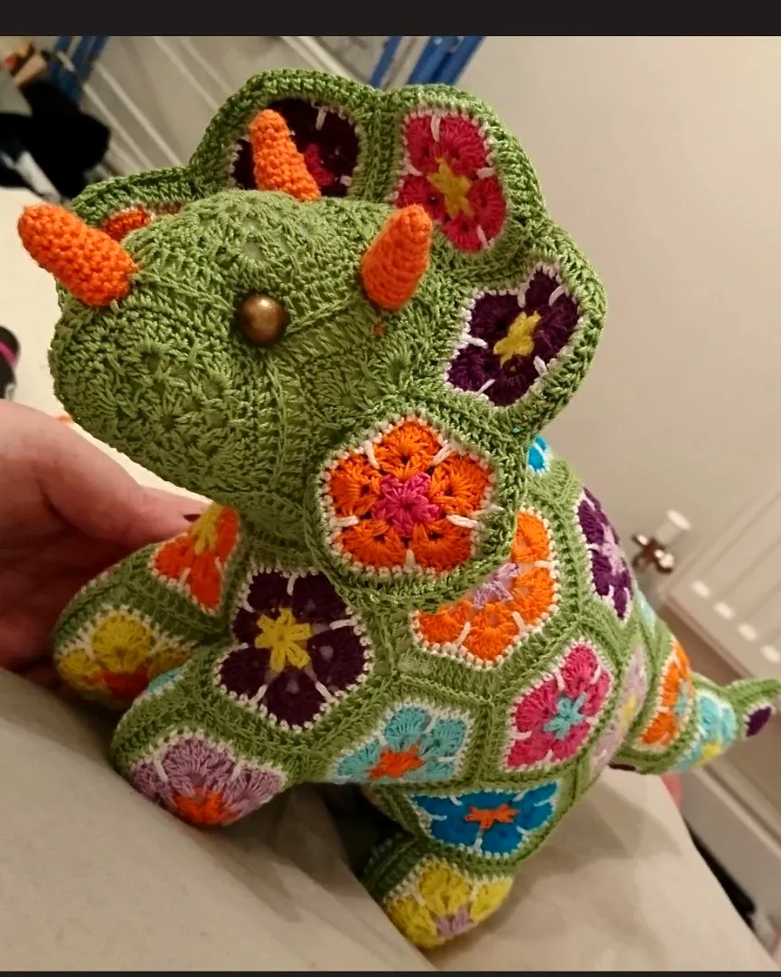 Vibrant Crochet Dinosaur Triceratops with Floral Motif for Intermediates