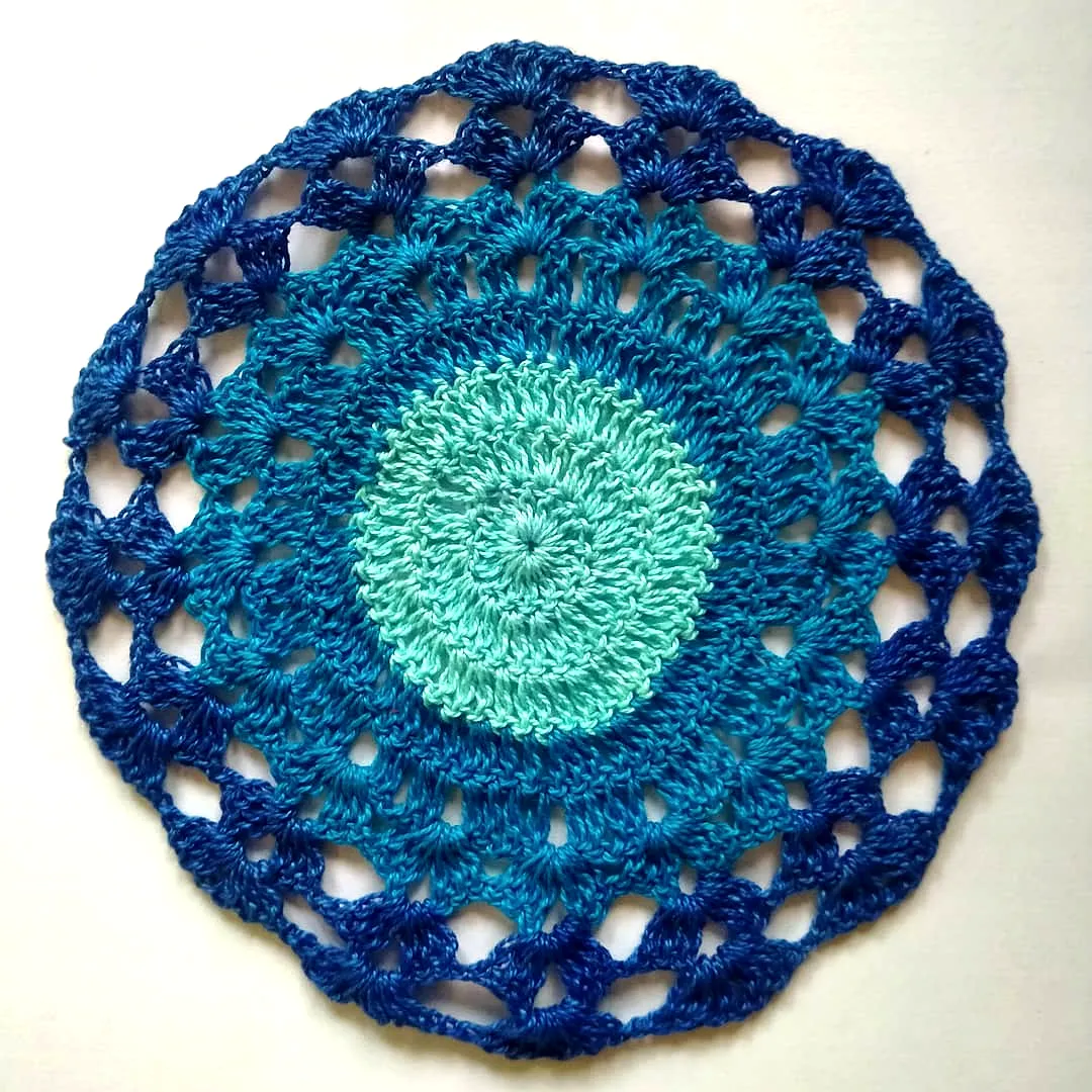 Vibrant Crochet Doily with Gradient Mint and Blue Design