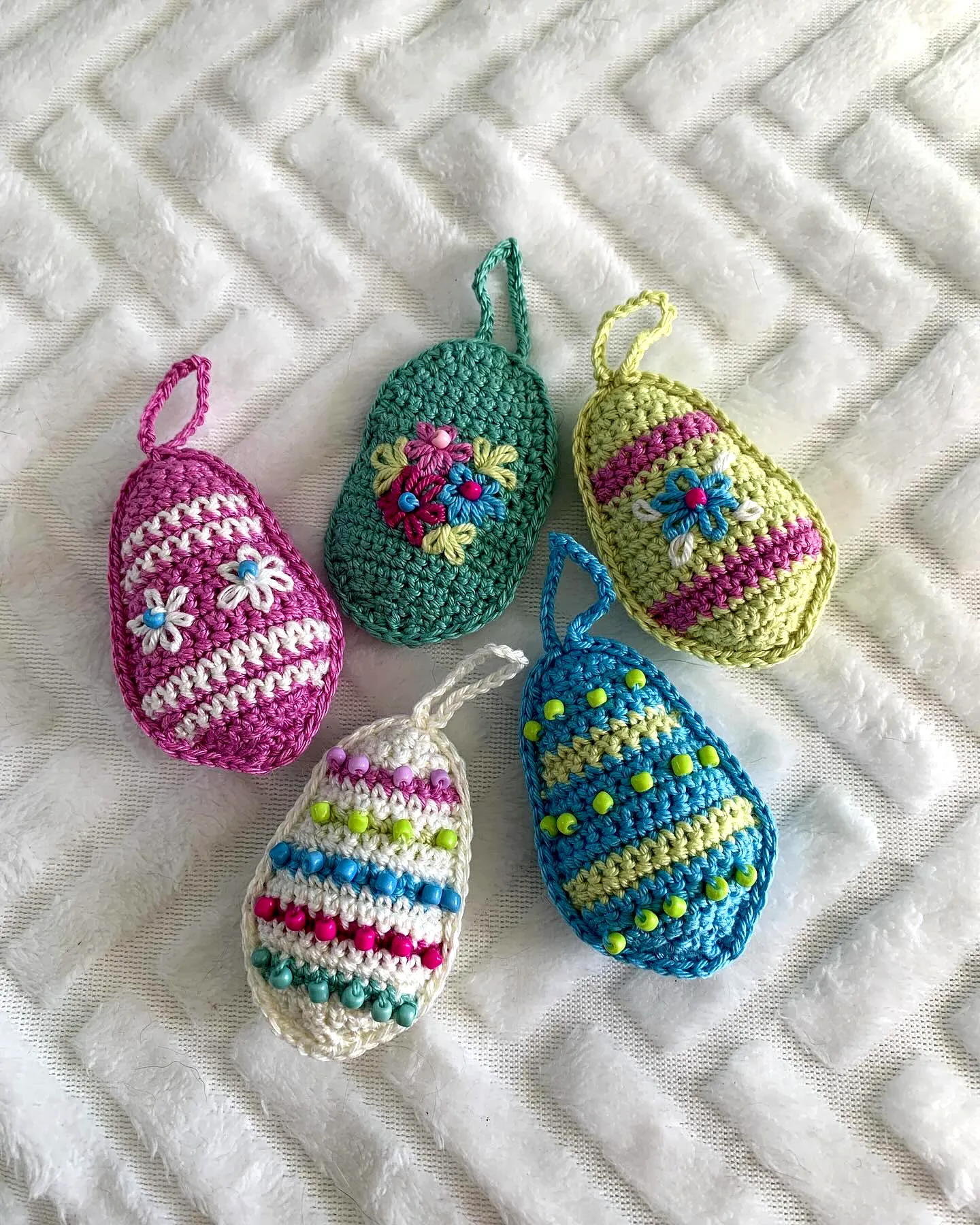 Vibrant Crochet Easter Eggs with Floral Designs