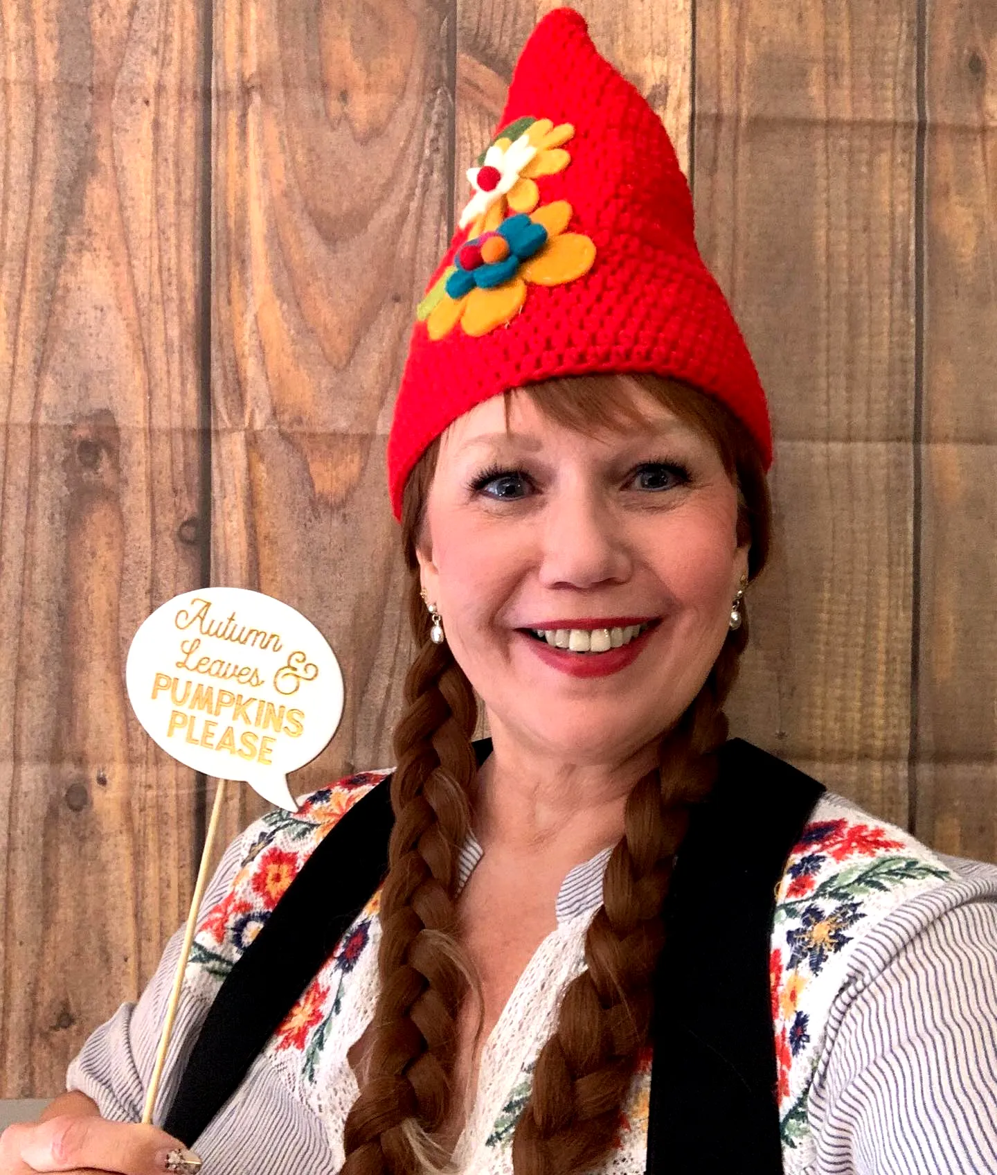 Vibrant Crochet Gnome Hat with Colorful Flower Appliques