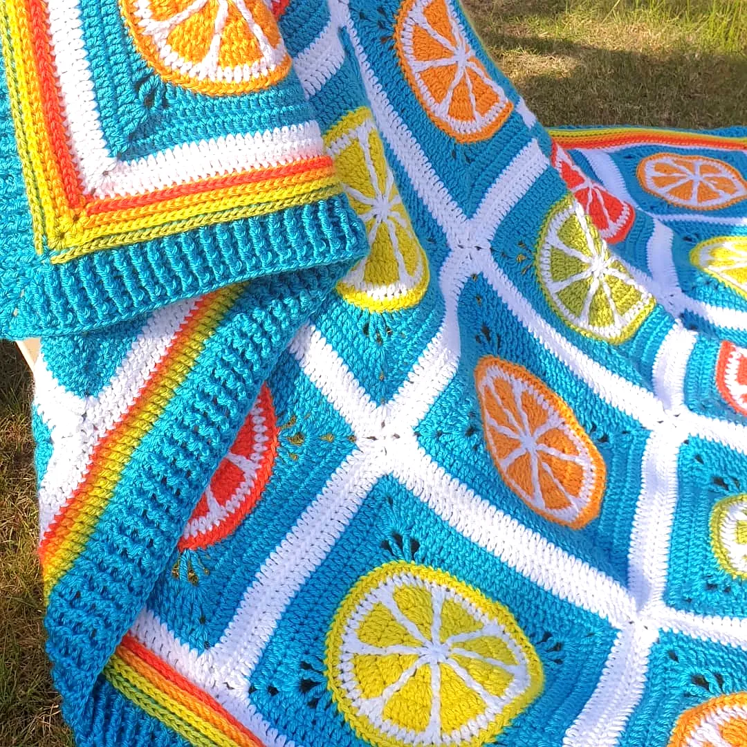 Vibrant Crochet Picnic Blanket with Citrus Motifs for Intermediates