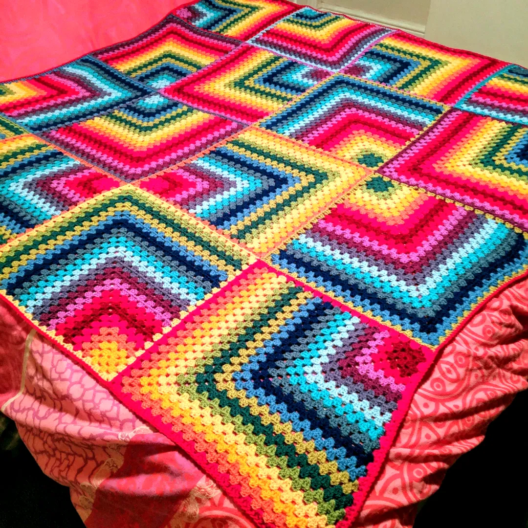 Vibrant Crochet Throw in Granny Square Zigzag Pattern