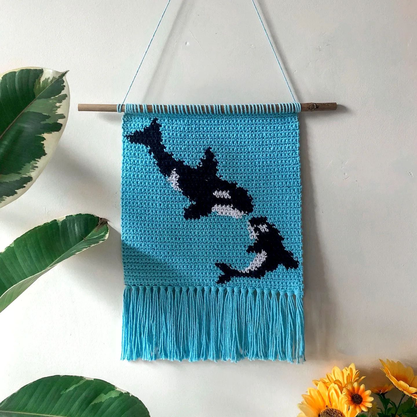 Vibrant Crochet Wall Decor with Playful Orcas and Fringe
