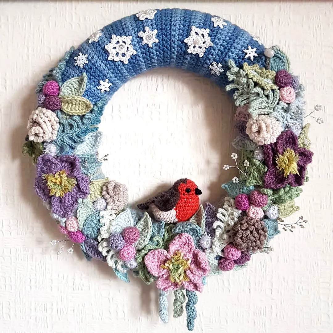 Vibrant Crochet Wreath with Colorful Flowers and Bird