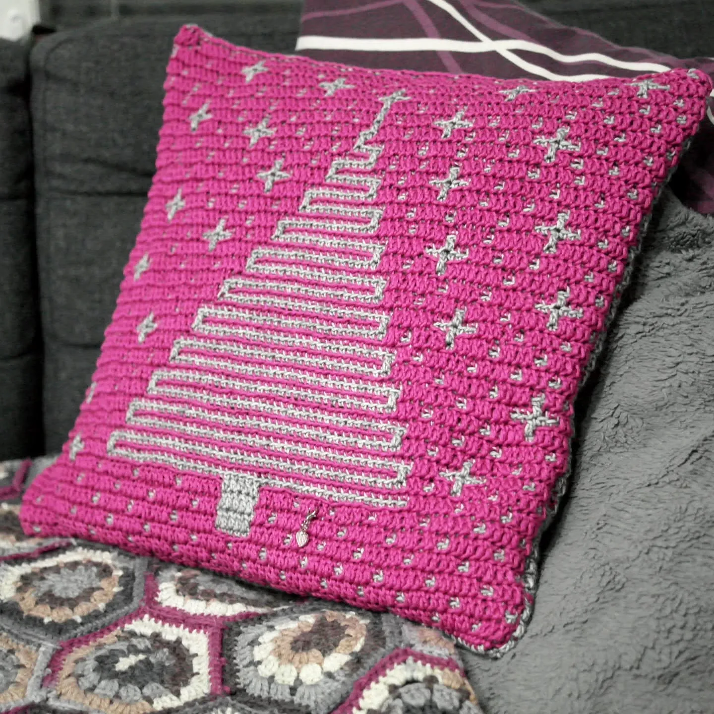 Vibrant Pink Crochet Cushion Cover with Festive Tree Design