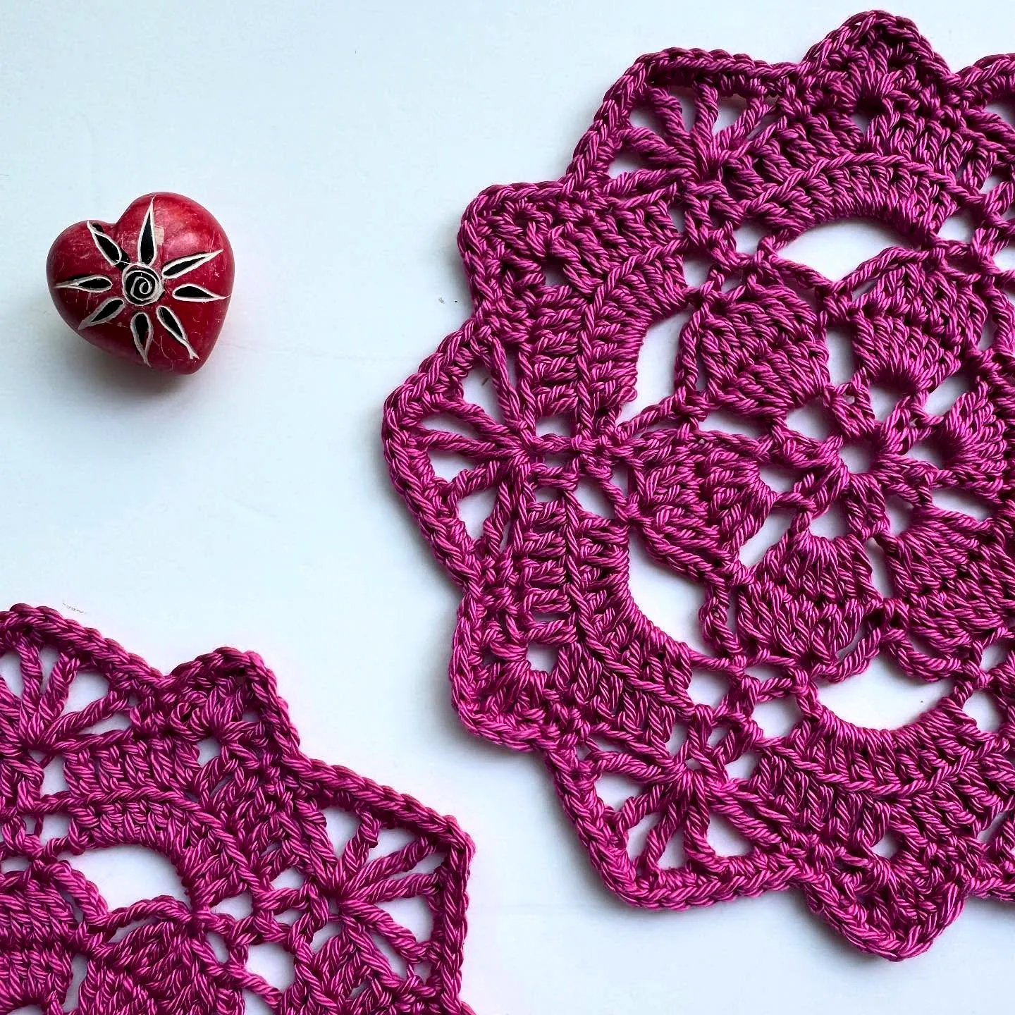 Vibrant Pink Crochet Doily with Intricate Lacy Design for Intermediate