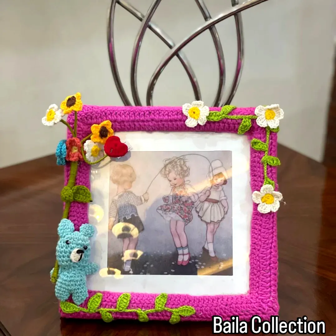 Vibrant Pink Crochet Photo Frame with Floral Embellishments