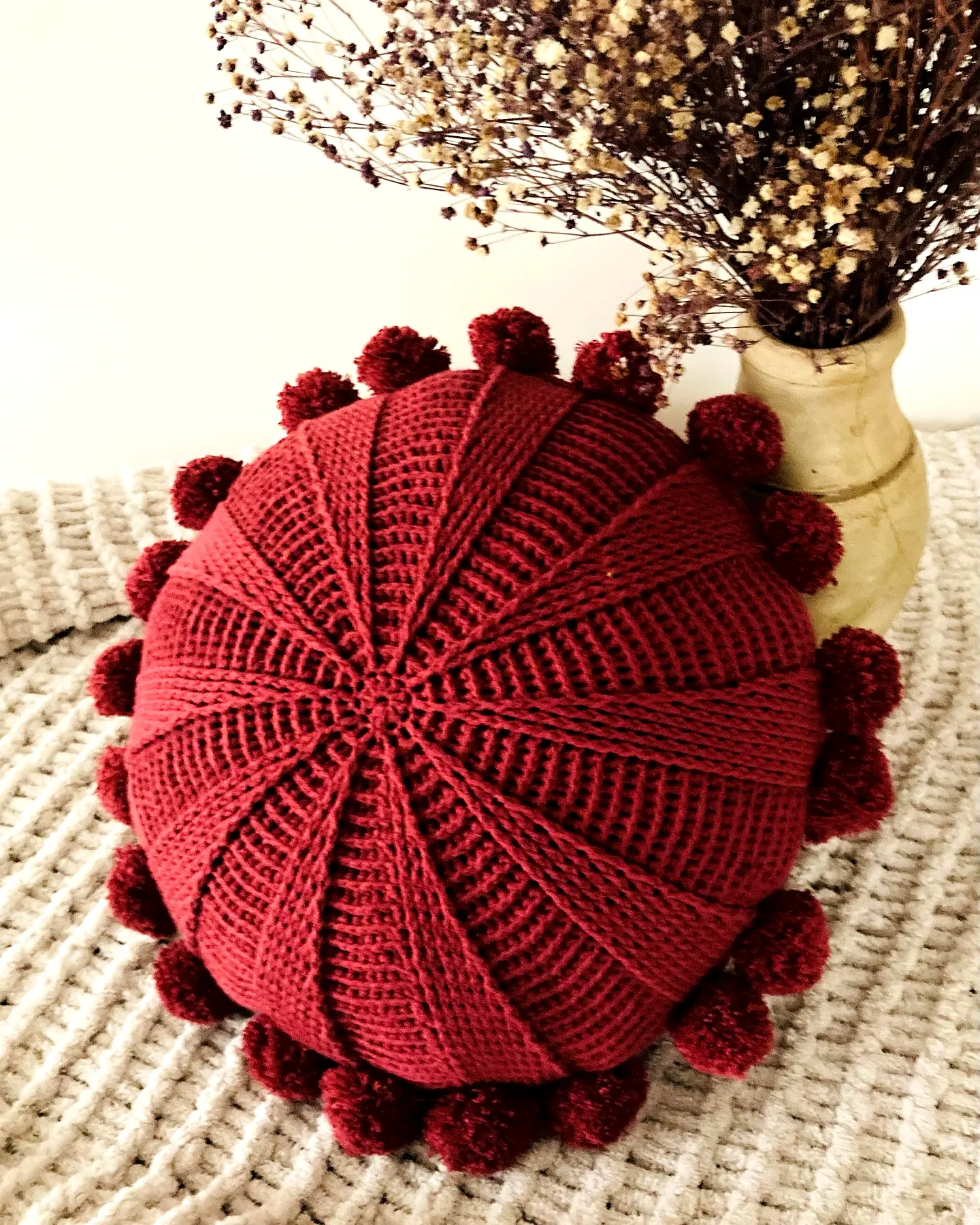 Vibrant Red Crochet Cushion with Pom-Pom Details for Intermediates